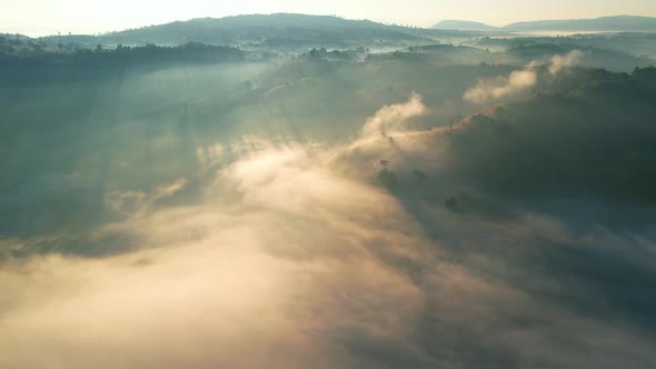 4K Aerial view of Mountains landscape with morning fog.