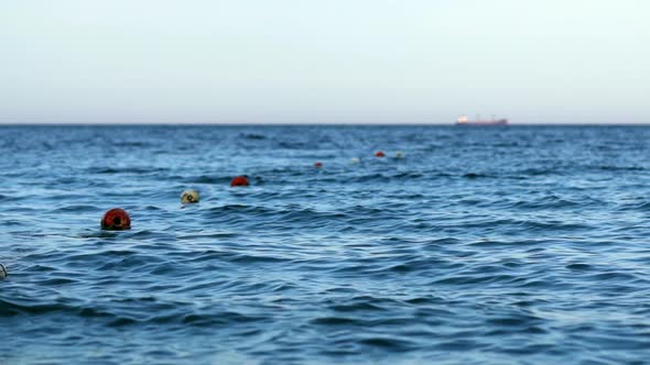 Floating buoys on water surface