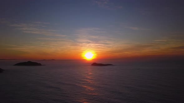 Very beautiful sunrise aerial flying over wild ocean in summer morning in Sydney nature from the pea