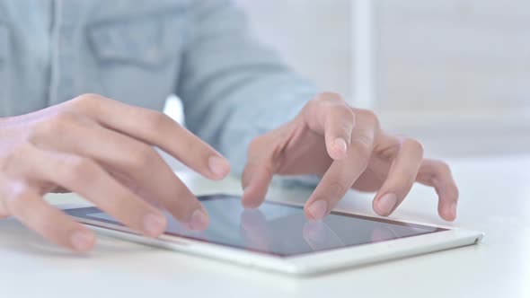 Close Up of Young Guy Hands Doing Creative Work on Tablet