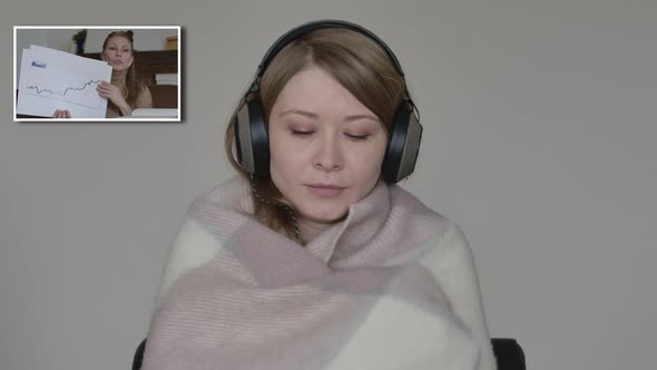 Blond Caucasian Woman Coughing, Sneezing and Wrapping in Blanket As Listening To Colleague