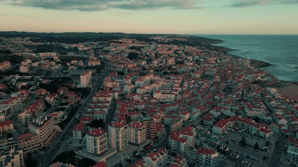 Aerial view of a beautiful city with the pinkish color clouds