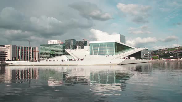 Time lapse of opera house in Oslo city and skyline. Norway