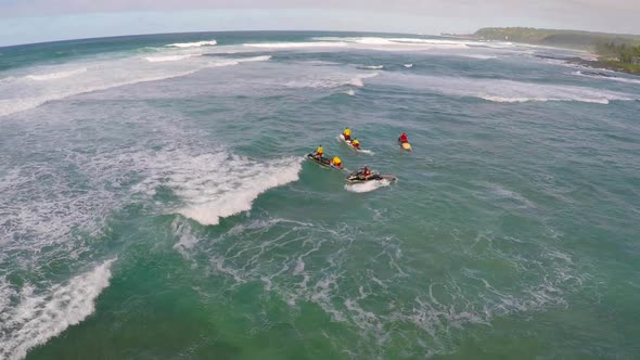 Aerial view of lifeguard surf rescue jet ski personal watercraft in Hawaii