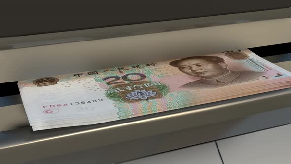 20 Chinese Yuan in cash dispenser. Withdrawal of cash from an ATM.