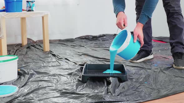 Pouring Blue Paint