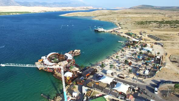 Aerial view of bungee jumping ramp on zrce beach, Pag