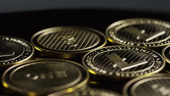 Rotating shot of Bitcoins (digital cryptocurrency) - BITCOIN LITECOIN 299