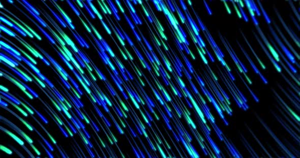 Animation of multiple glowing lights trail against black background