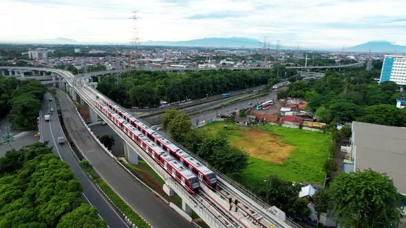 Aerial view of Jakarta LRT train trial run for phase 1 from UKI Cawang