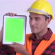 Face of Young Happy Hispanic Man Construction Worker Showing Digital Tablet - VideoHive Item for Sale