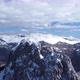 Aerial drone view of difficult access mountain peak for climbers during a winter sunny day. - VideoHive Item for Sale