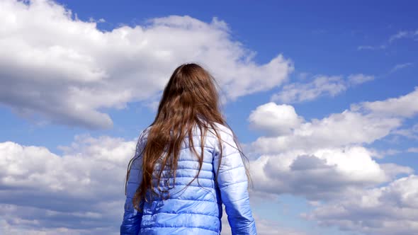 Happy Child with Long Hair in Autumn Jacket Enjoy the Sun on Sky Background Inspiration