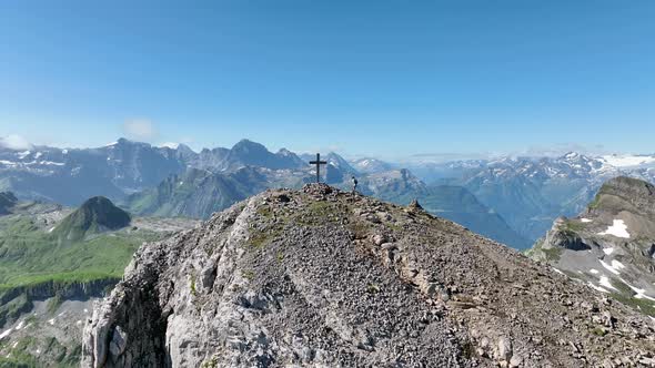 Aerial view of a cross on mountain top, Chaiserstock, Switzerland. . alt