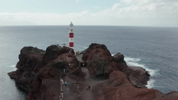 Aerial survey above the roads in Tenerife, Canary islands, lighthouse Teno