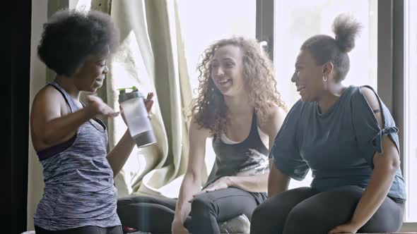 Women Chatting after Fitness Class