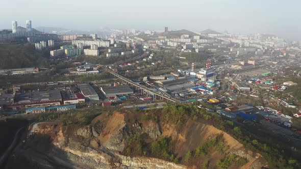 Spring View From a Drone of a City with Hills at Sunrise