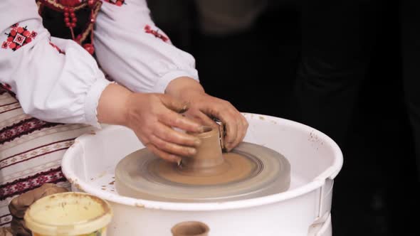 Process Of Creating A Clay Pot. Using Hands. Pottery Craft Wheel And Ceramic Clay Pot