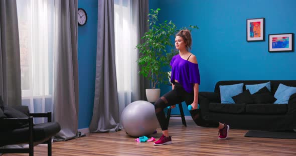 Profile View of Sporty Girl Doing Lunges Workingout Leg Muscles and Glutes in Loft Interior