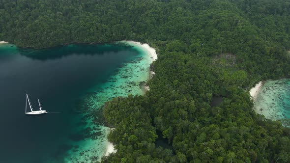 Triton Bay: Boat On Turquoise Sea And Green Tropical Trees In Kaimana Islands