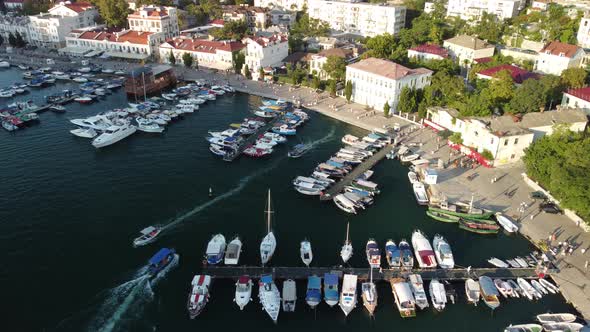 Aerial Panoramic View of Balaklava Landscape with Boats and Sea in Marina Bay on Sunset Time