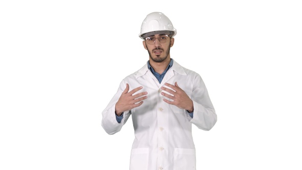 Arab engineer presenting something talking to camera while