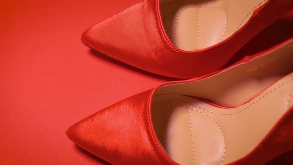 Beautiful Red High Heel Shoes on a Minimalist Background