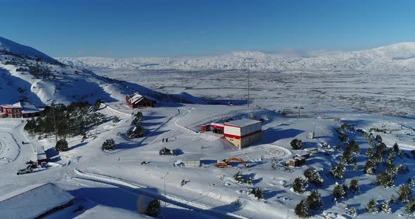 Ski Center And Snowy Mountains Aerial View 4