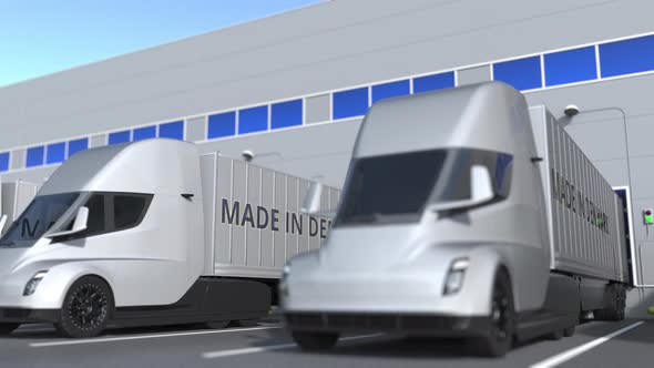 Modern Semitrailer Trucks with MADE IN DENMARK Text
