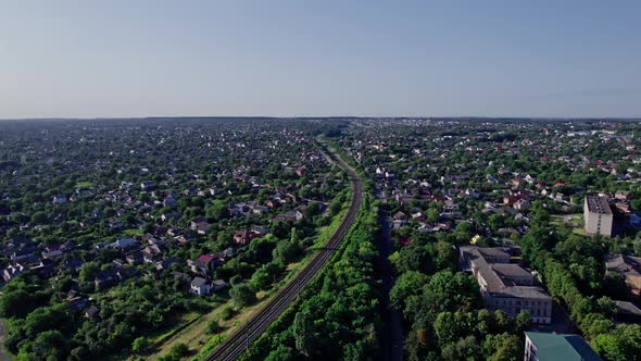 Cars and Trucks Driving Along Road and Bridge