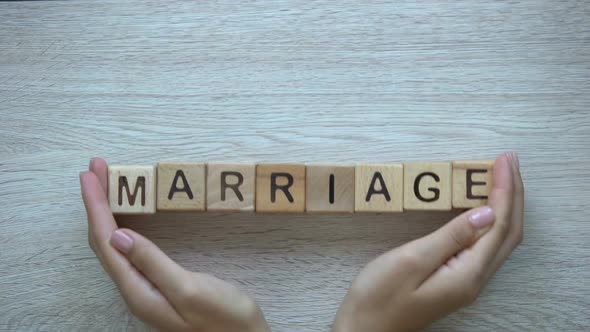 Marriage, Hands Pushing Word on Wooden Cubes, Family Wife Husband and Children