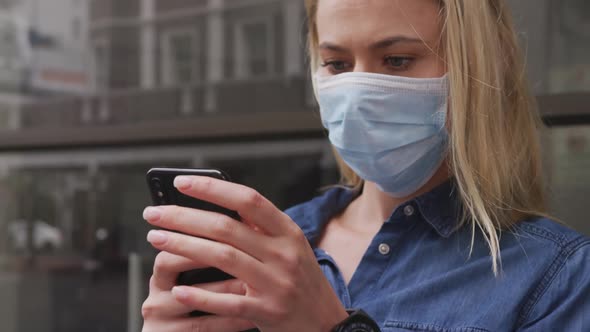 Side view of Caucasian woman wearing a coronavirus Covid19 mask