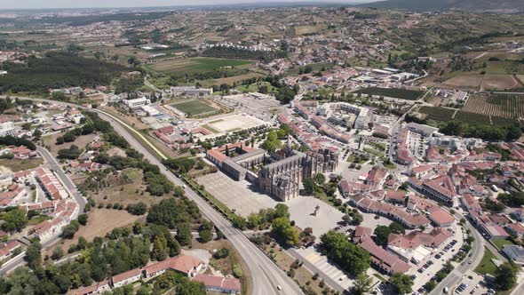 Aerial scenic view of Batalha Monastery, surrounding town and IC2 motorway