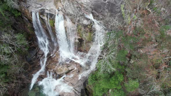 Water flowing in waterfall. Paradise Lost Waterfall Cliff