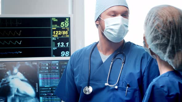 Professional medical doctors working in emergency medicine. Portrait of surgeon and the nurse.