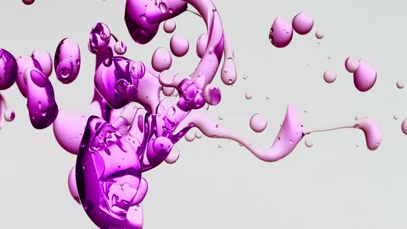 transparent purple pink, violet oil bubbles and fluid shapes in purified water on a white gradient b