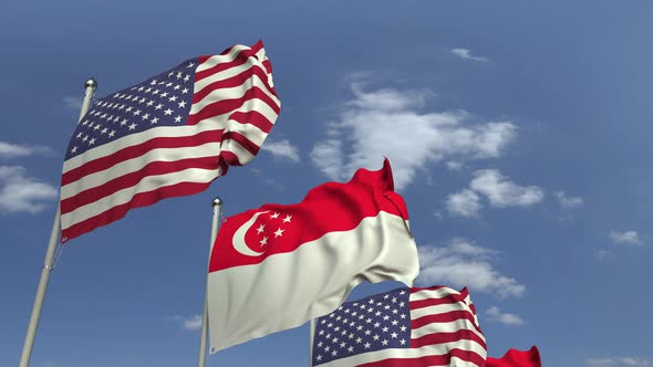 Waving Flags of Singapore and the USA