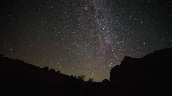 Time lapse of stars at night over Utah desert