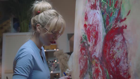 Talented Female Artist Working on a Modern Abstract Oil Painting Uses Splattering and Dripping with