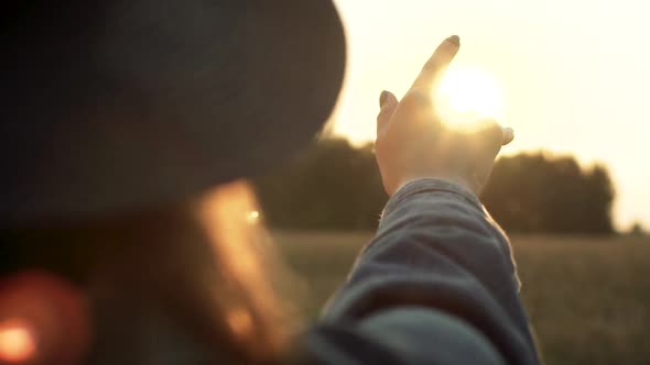 Hand Playing With Sun Rays