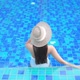 Young asian woman enjoy around outdoor swimming pool for leisure - VideoHive Item for Sale