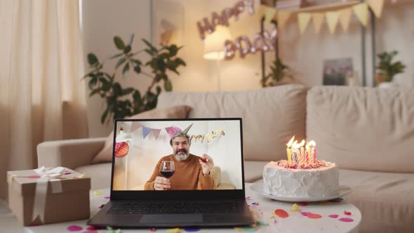 Man Celebrating Birthday On Laptop Screen