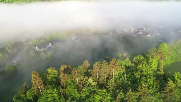 Flying over the foggy countryside