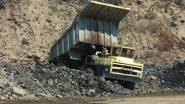 Open Mining Pit with Heavy Machinery