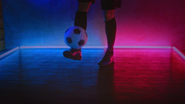 Soccer Amateur Player Kicks a Ball By His Feet