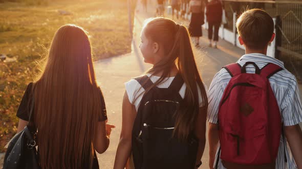 Slow Motion of School Children Walking Down the Street