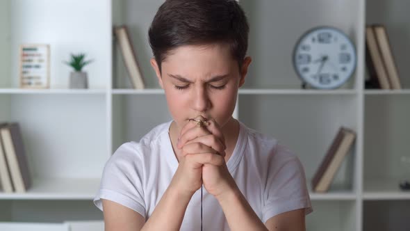 13 Years Old Boy Makes a Wish Prays Religion Concept