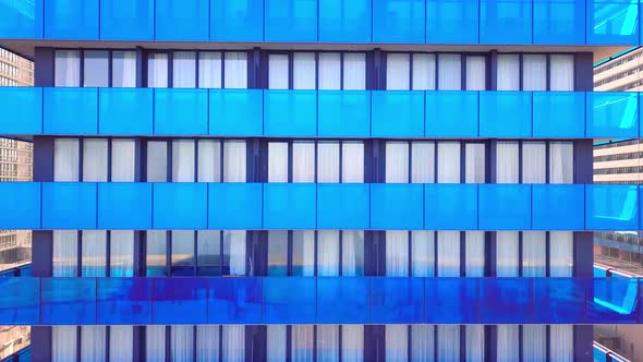 facade of a modern mirrored office building was removed from a drone. close-up