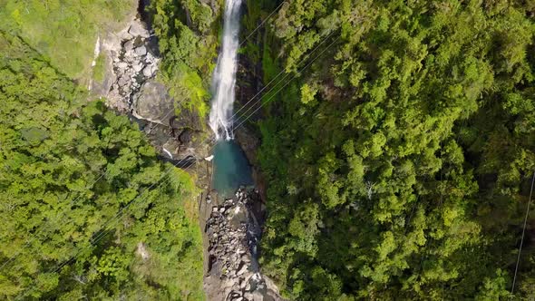 Bird's Eye View Of Waterfalls And Green Lush Vegetation Surrounding Sagada Mountain Province