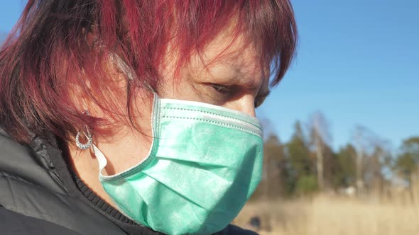 A Depress Look of the Lady During the Quarantine Period in Finland